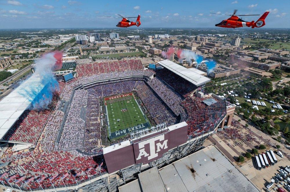 U.S. Coast Guard MH-65 Dolphin helicopters fly over Kyle Field, in College Station, Texas, before a Texas A&M home game on September 12, 2026.