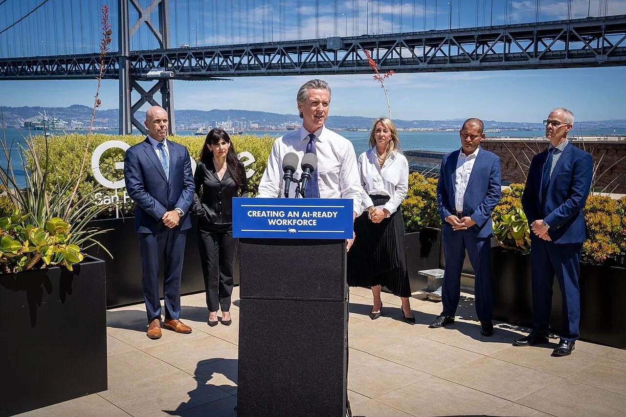 Governor Gavin Newsom at a 2025 press conference on California's artificial intelligence workforce agreements with technology companies.