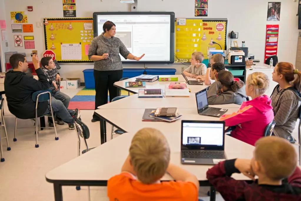 Sixth-graders work on their laptops during class in Stockport, Ohio, in February 2015.